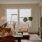 airy living room with city views apartment in cleveland ohio - Church + State