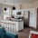 Kitchen island and modern appliances - Church + State Apartments